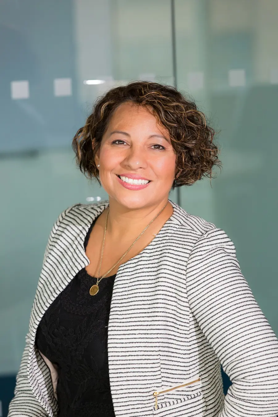 Bilingual health-insurance advisor smiling